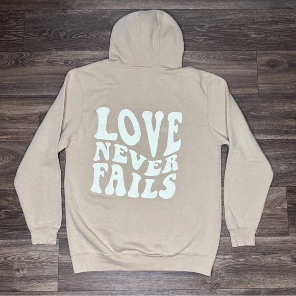Tan Sweatshirt with 'Love Never Fails' Design Size Medium - Picture 10 of 10